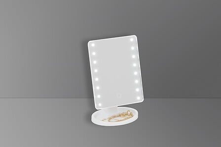 Free-standing pivot mirror with LED